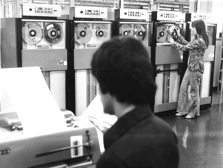 Bank of tape drives for data storage in Telex facility