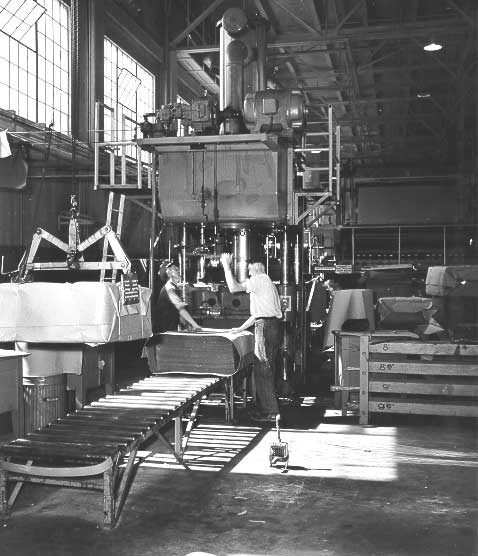 Pulp baling, Baldwin Press in background, MacMillan Bloedel Ltd