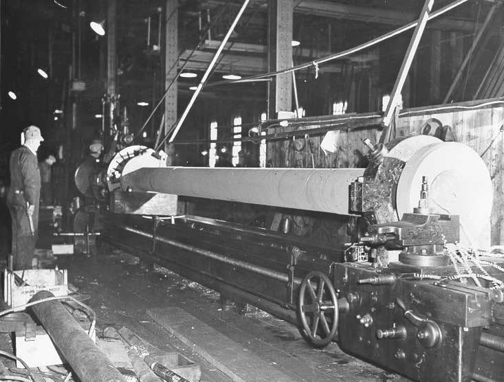 Prince Rupert shipyard : propeller shafts for freighters are turned on huge lathes in machine shop