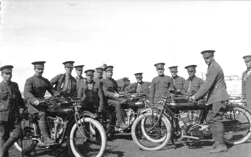 Canadian soldiers on their Indian motorcycles at a WWI training camp