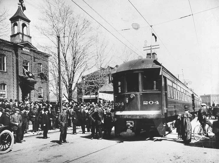First train arriving in Granby: Montreal & Southern Counties Railway