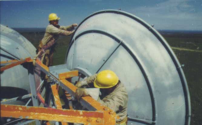 Repair workers on microwave tower