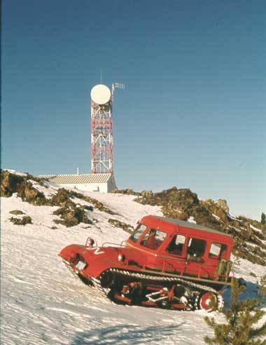 Snotrac in front of microwave relay station