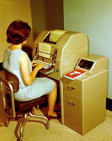 Telex operator types message on teleprinter