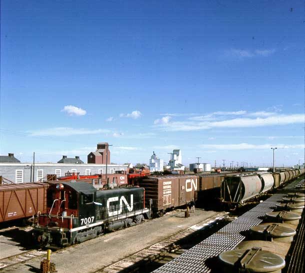 Freight train transporting potash in yard