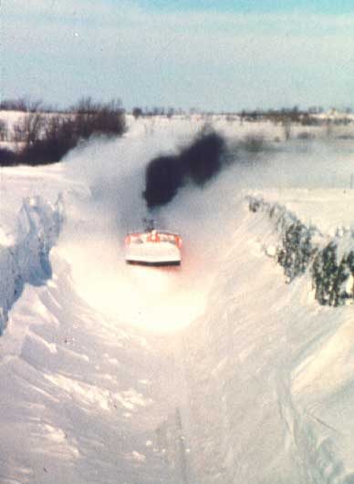Snow plow clearing snow