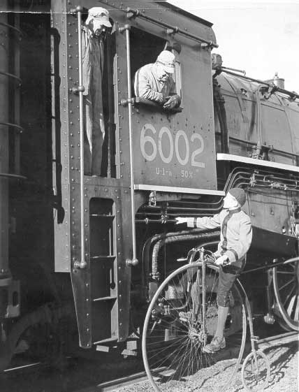 Old bicycle meets locomotive