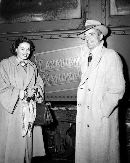 Actors Gene Tierney and Dana Andrews come to Ottawa to film Iron Curtain