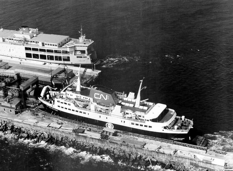 Roll-on/roll-off car/passenger ferry MV Lucy Maud Montgomery at the terminal with MV Holiday Island