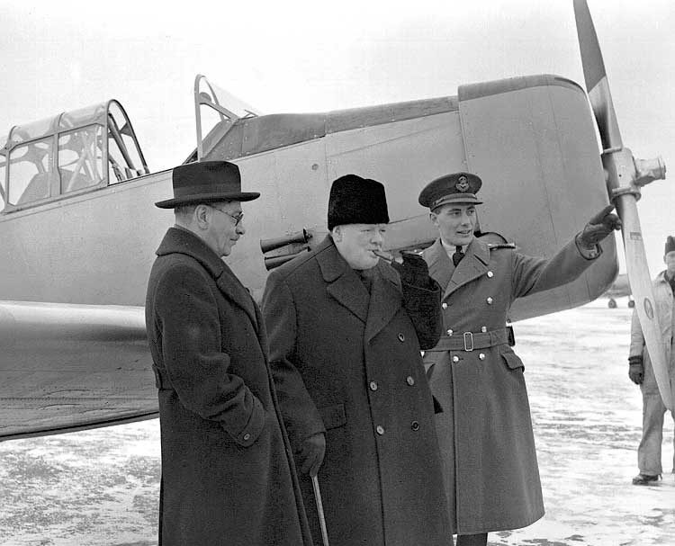 Hon. C.G. Power, Minister for Air, Sir Winston Churchill, and Wing Commander W.R. MacBrien