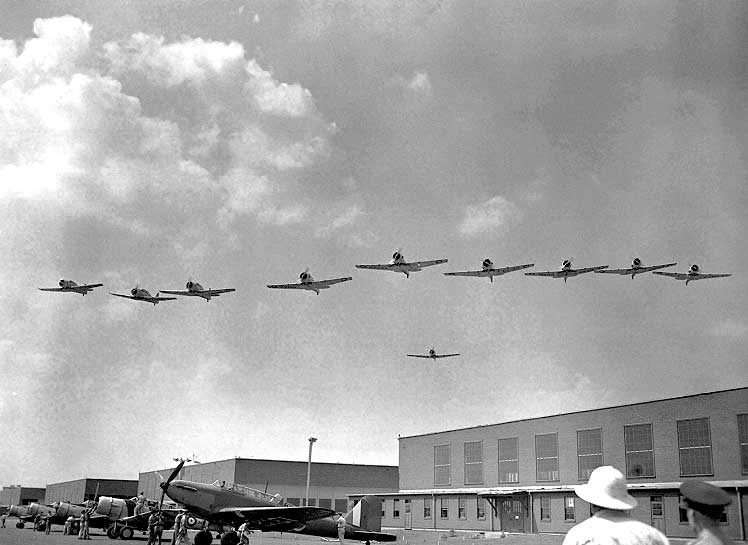 A squadron of Harvards in flight at a training school