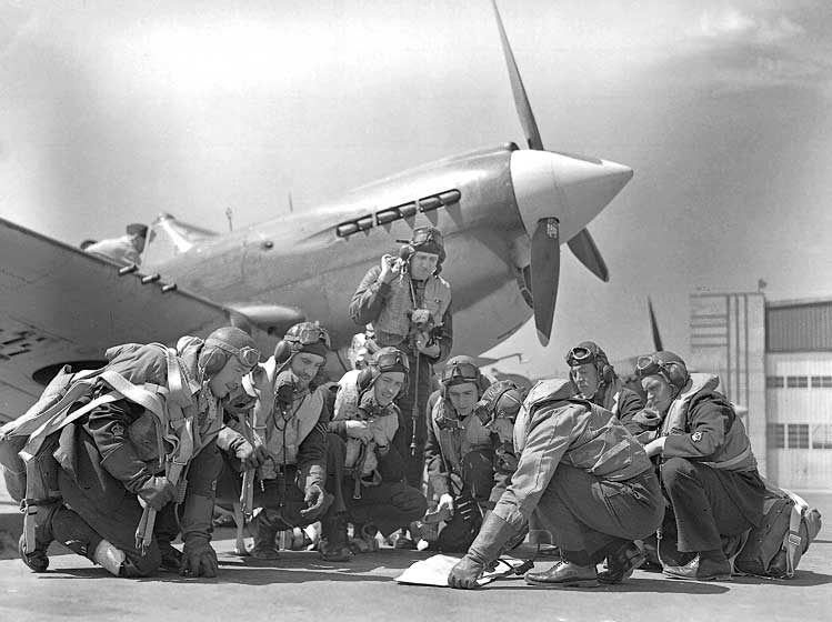 Royal Canadian Air Force Fighter Squadron pilots plot the day's course