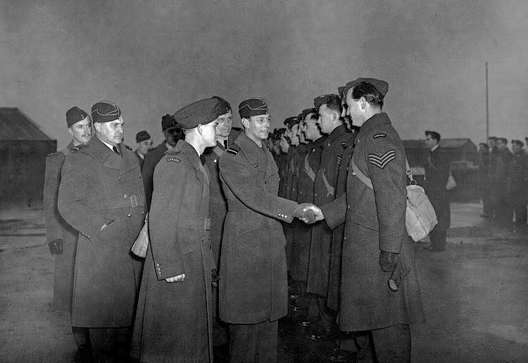 King George VI visiting a Royal Canadian Air Force Fighter Squadron which does operational flying