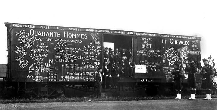 Members of the Royal Canadian Legion, Vimy Branch no. 27 in a box car they decorated at a reunion