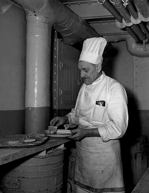 Chef Baker Brockwell serves a slice of pie aboard the CNSS Lady Nelson