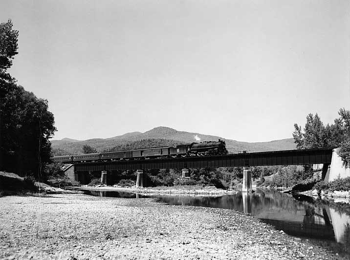 Central Vermont Railway steam locomotive 603 with the train The Ambassador in tow as it crosses the Winooski bridge