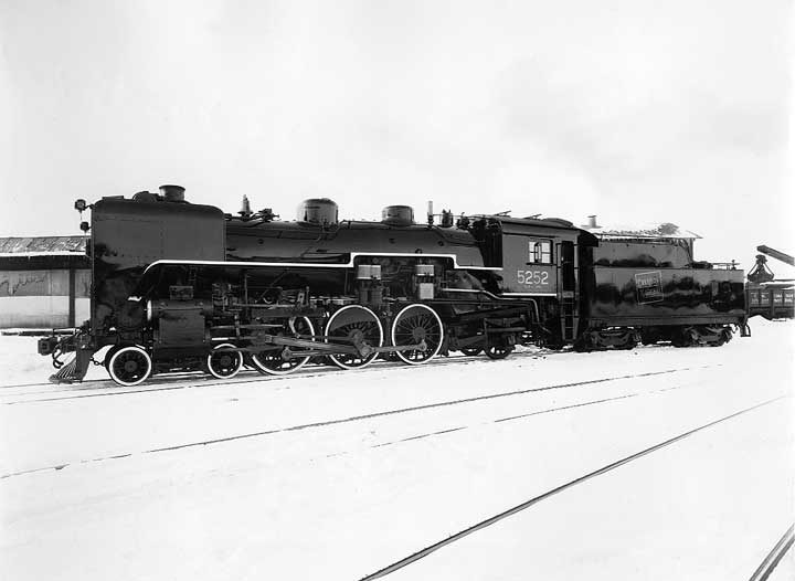Canadian National Railways steam locomotive 5252 with a smoke deflector on the front sides, left side