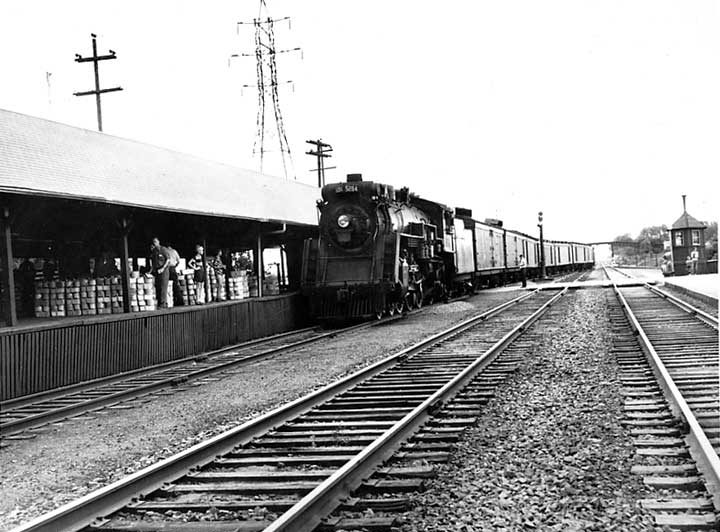 Canadian National Railways steam locomotive 5284 pulling into Grimsby station to pick up a shipment of fruit