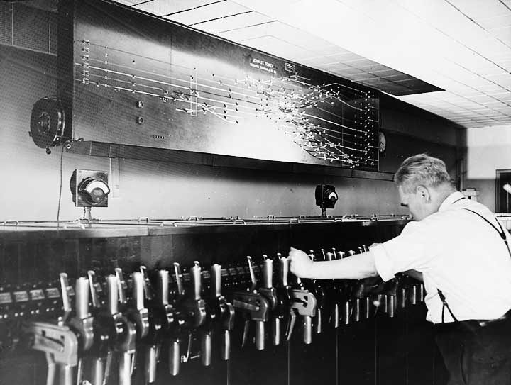 Leverman in the John Street switch tower, Toronto Terminal Railway Yard