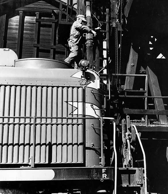 Central Vermont Railways steam locomotive 3901 being filled with sand at St. Albans yard