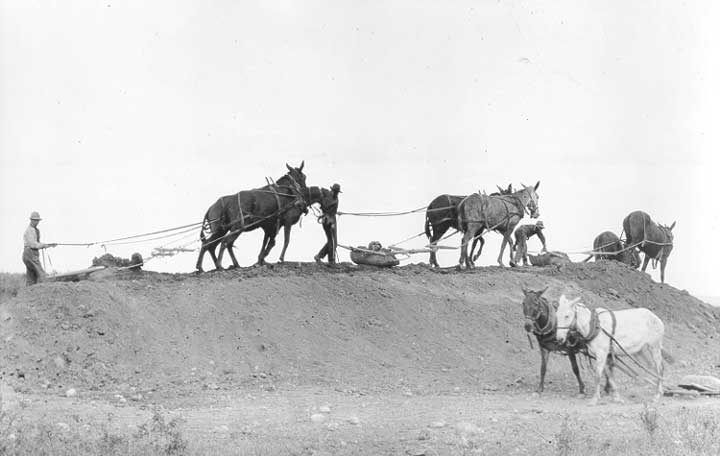 Workers grading railroad right of way in Western Canada