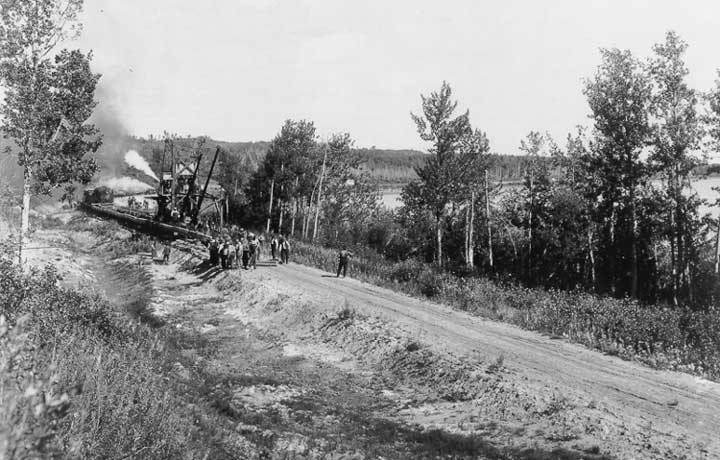 Track laying machine along the Grand Trunk Pacific Railway line west of Winnipeg