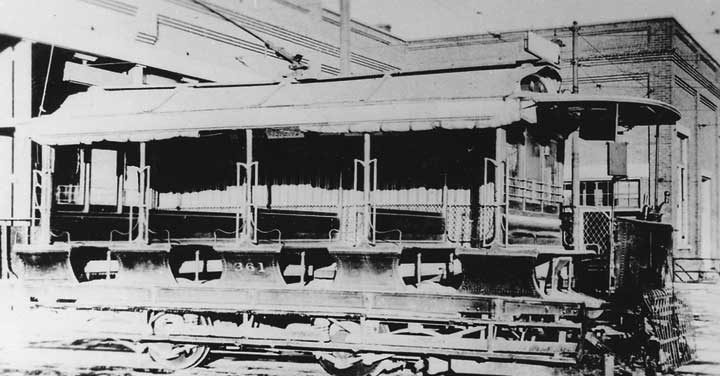 A Toronto Railway Company open air electric streetcar, no. 361, side view