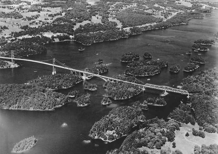 An aerial view of Ivy Lea Bridge across the narrow most point in the St. Lawrence River connecting the Canadian and American shores