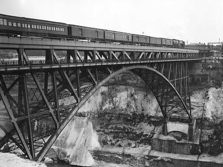 A Canadian National Railways passenger train crosses the bridge near Niagara Falls in winter