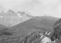 The Canadian National Railways passenger train Continental Limited rounds a curve near Mount Robson