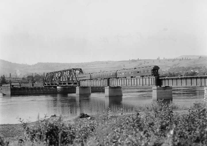 Canadian National Railways passenger train Continental Limited crosses the Thompson River Bridge