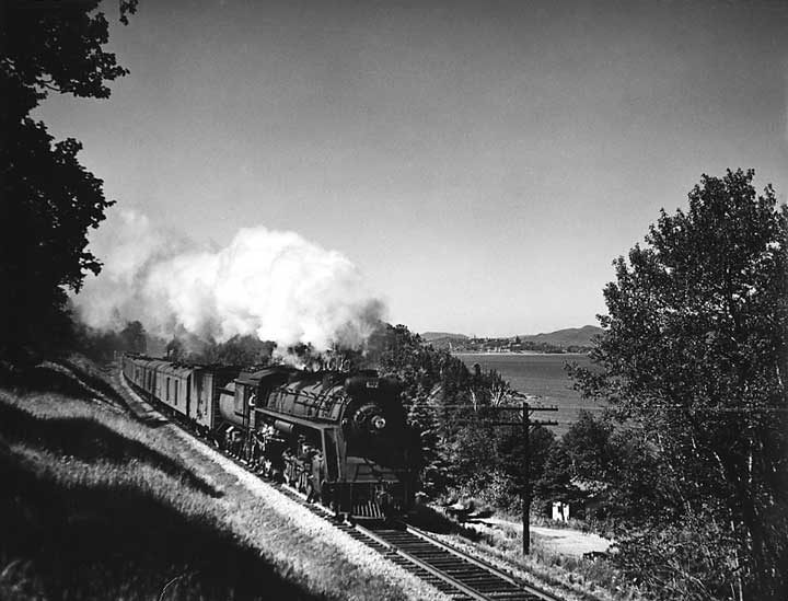 Canadian National Railways passenger train The Scotian, hauled by steam locomotive no. 6177, travels through New Brunswick
