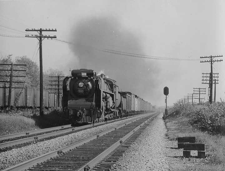 Canadian National Railway steam locomotive no. 6226 hauls a freight train near Vaudreuil