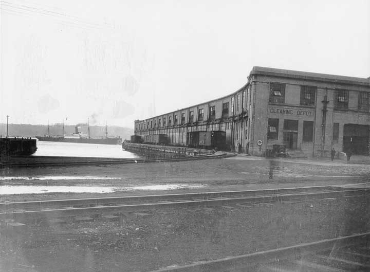 Railway cars near the clearing depot at the Immigration sheds Pier no. 2