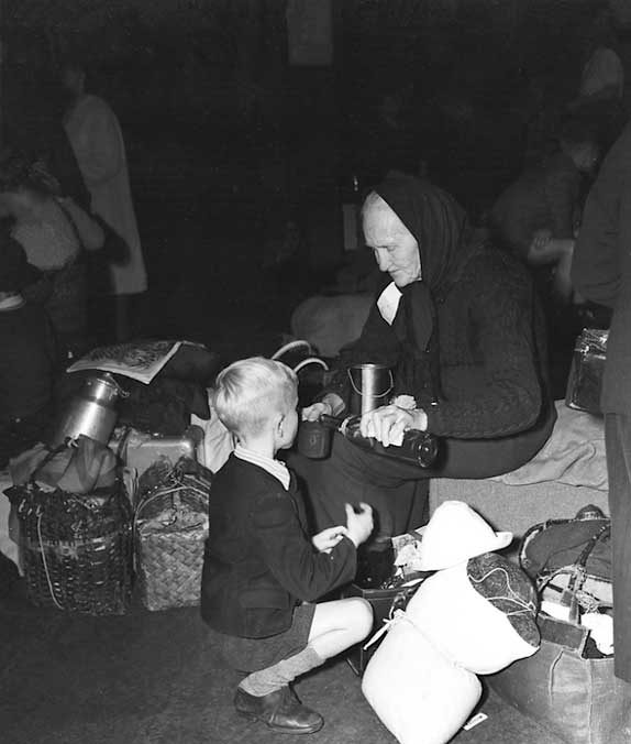 A family of displaced persons waiting at Halifax