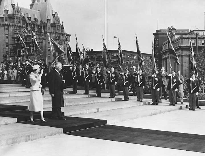 Queen Elizabeth II attends a ceremony at the Cenotaph during her visit to open the 23rd session of the Canadian Parliament