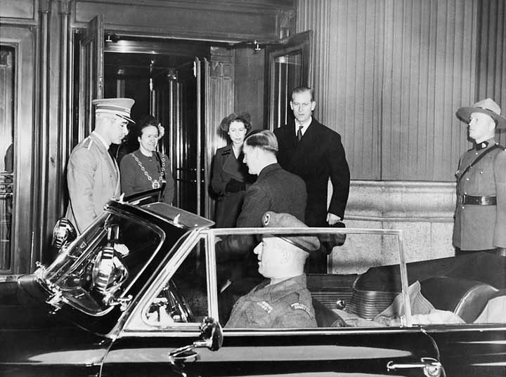 Princess Elizabeth and the Duke of Edinburgh are greeted by Mayor Charlotte Whitton at the Chateau Laurier