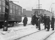 Officials and passengers examine a derailed street-railway car on the Montréal Tramways Company line to Lachine
