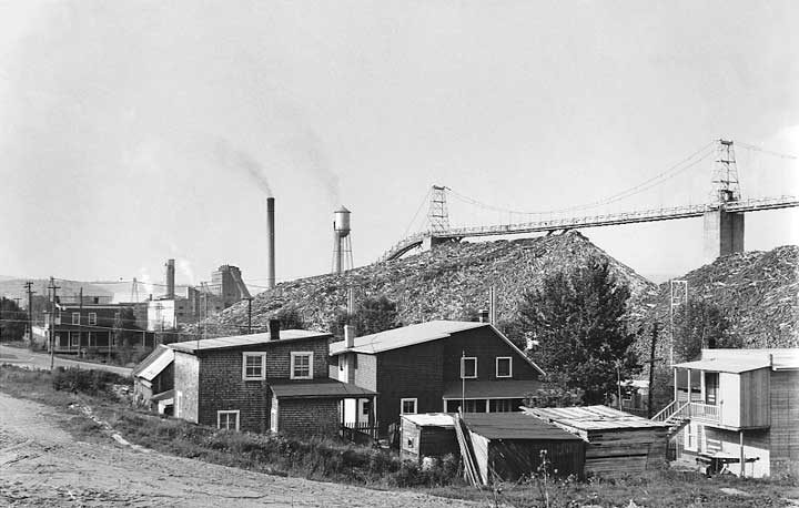 Houses beside a pulp pile