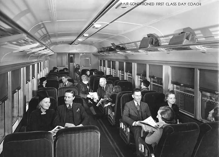 Passengers enjoying an air-conditioned first class day coach
