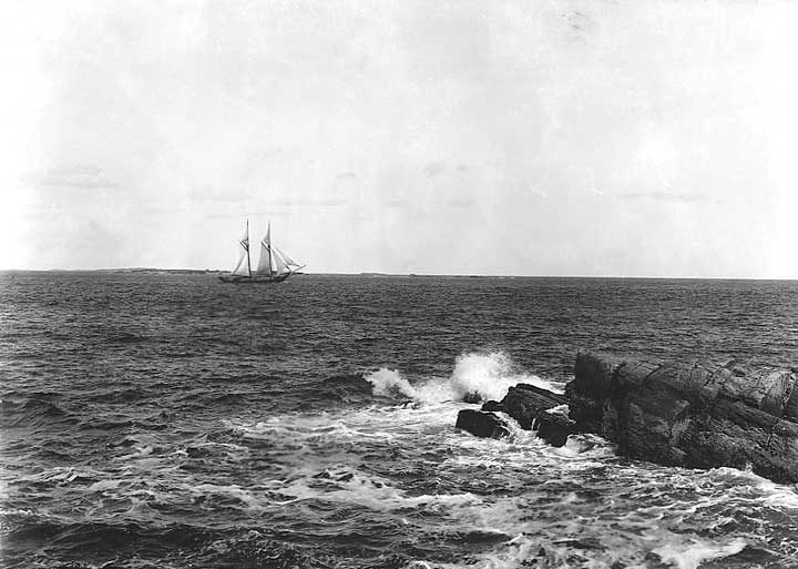 A fishing schooner along the coast of New England