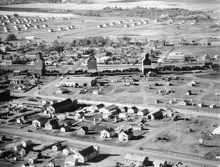 An aerial view of Redwater showing oil tanker cars and grain elevators