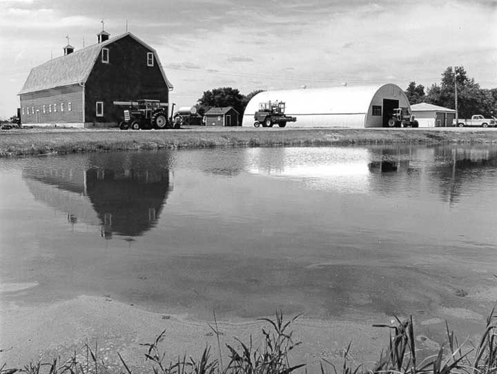 Farm buildings and pond