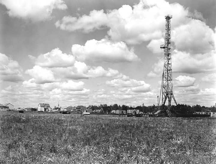 Town development near an oil drilling rig