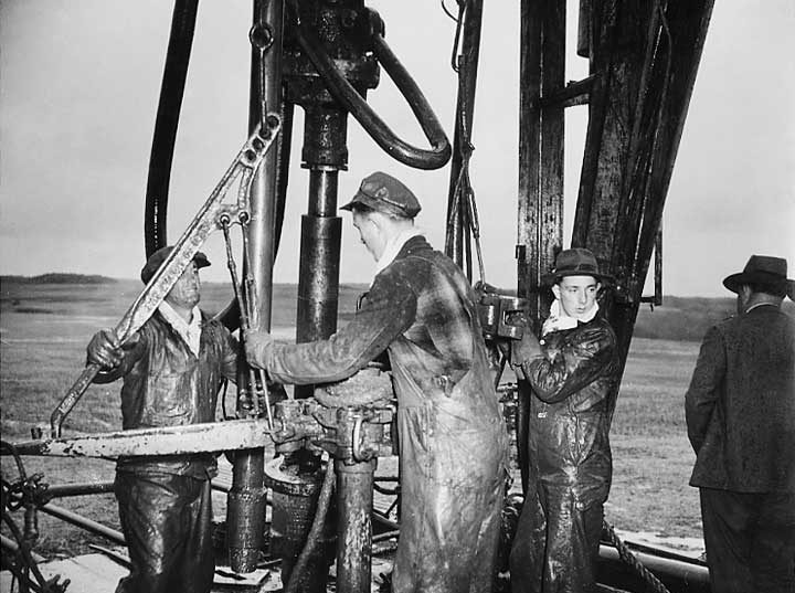 Oil workers operate canner no. 1 well at the Vermillion oil fields
