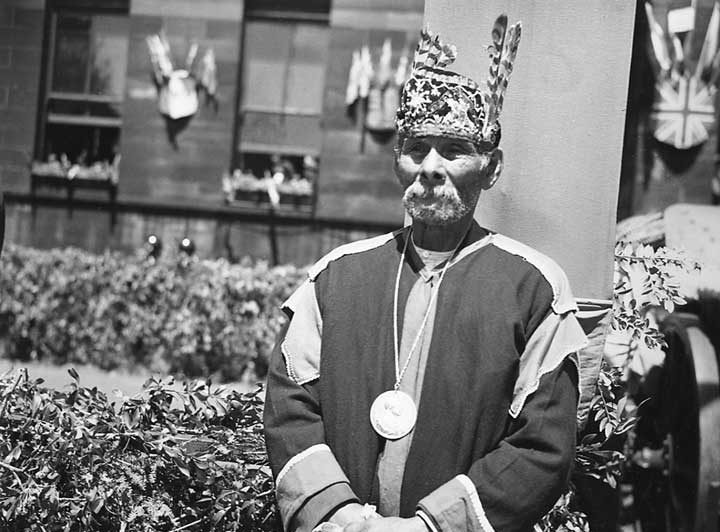 A Mi'kmaq Chief waits to be presented to their Majesties during the 1939 Royal Tour of Canada