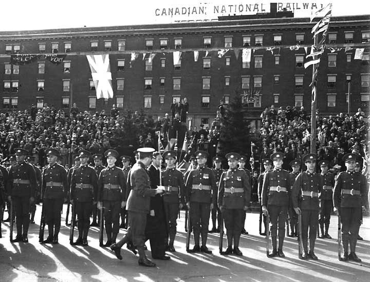 His Majesty King George inspects a Guard of Honour in front of Canadian National Railways Prince Arthur Hotel during the 1939 Royal Tour of Canada
