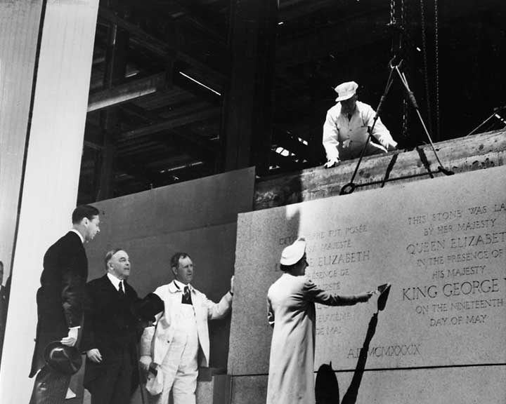 Her Majesty Queen Elizabeth lays the corner stone of the Supreme Count Building during the 1939 Royal Tour of Canada as King George VI and Prime Minister King look on