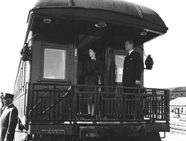 Princess Elizabeth and the Duke of Edinburgh on the platform of the observation car during the 1951 coast-to-coast Royal Tour of Canada
