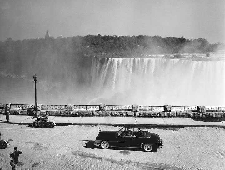 Princess Elizabeth and the Duke of Edinburgh drive beside the Niagara Fals during the 1951 coast-to-coast Royal Tour of Canada